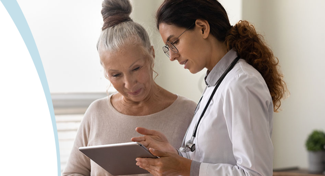 Older woman talking with her doctor
